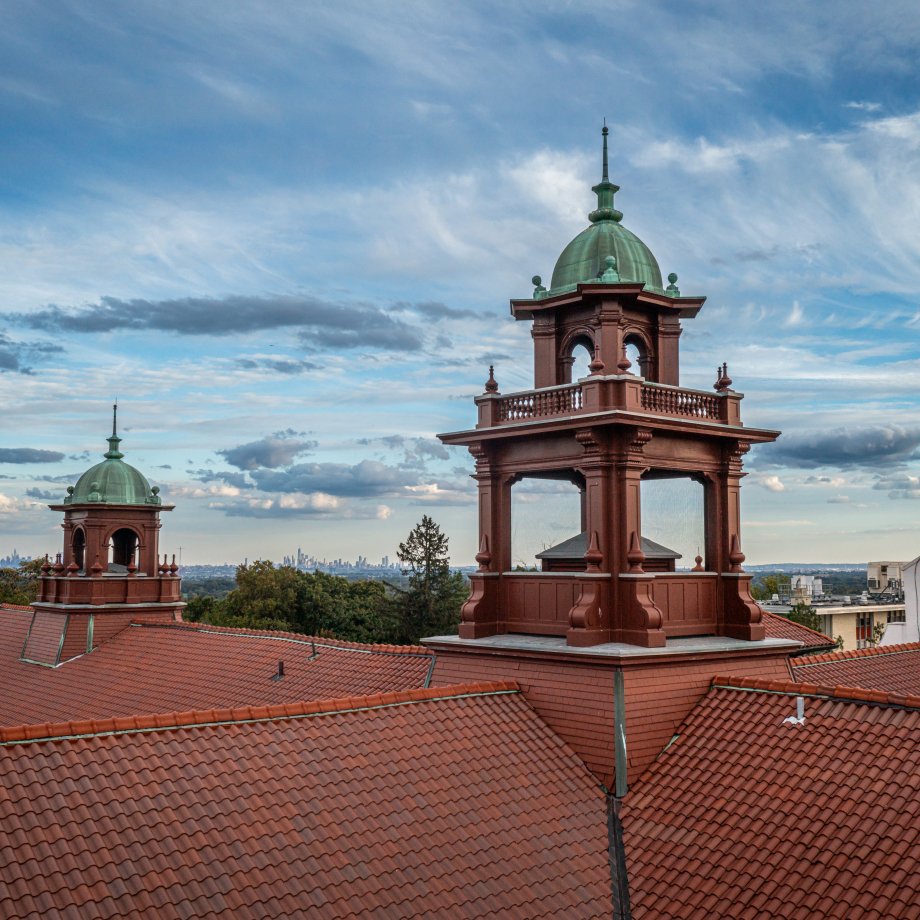 Aerial photograph depicting the roof of Cole Hall and a scenic view of the sky