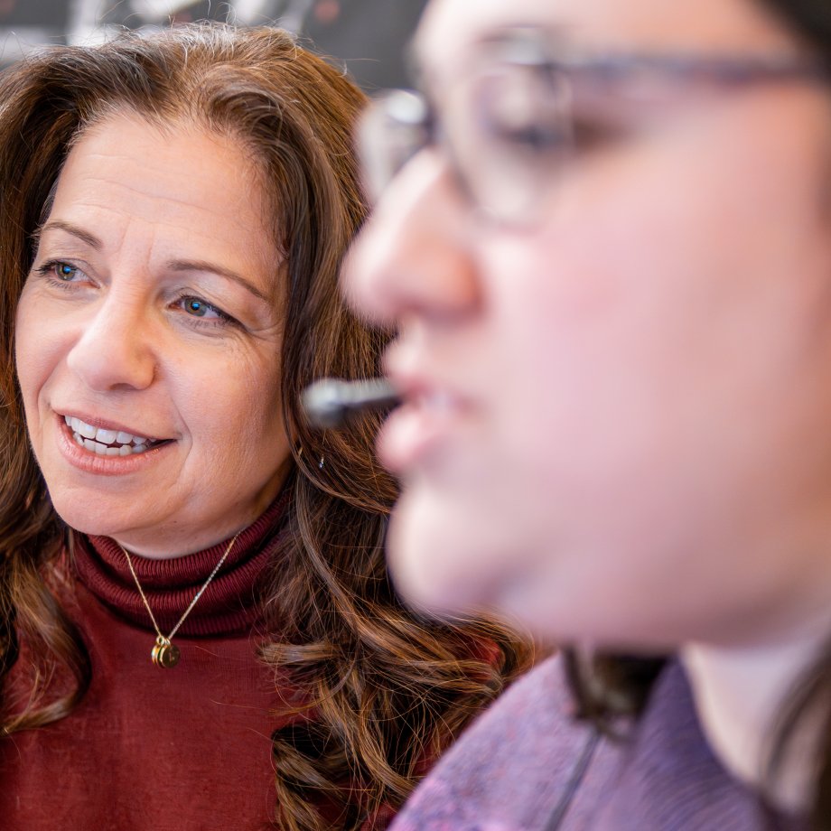 Department Chair, Dr. Elaine Hitchcock, engaging in a student's research.