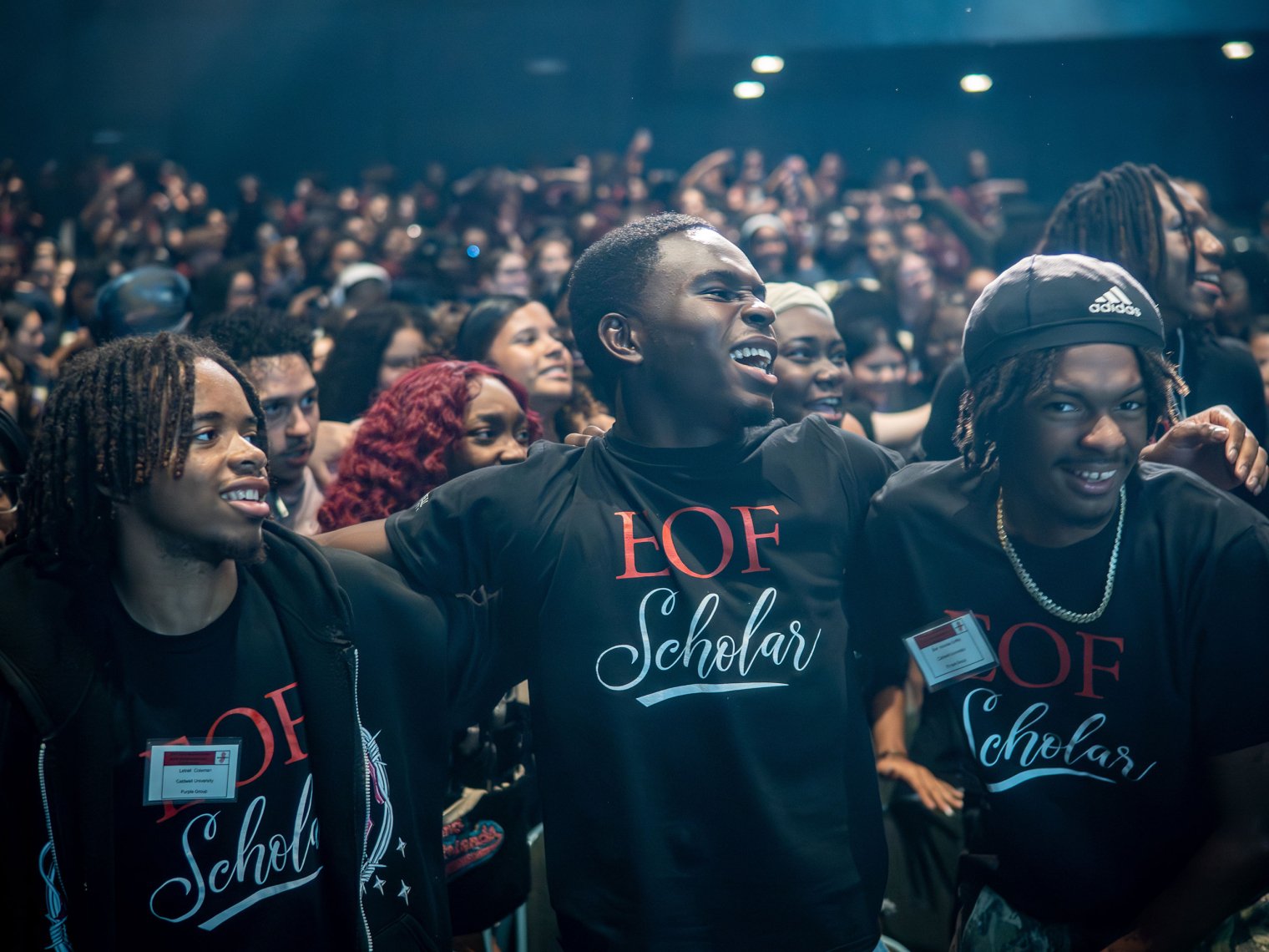 Students embrace as they share a moment at the EOF Conference.