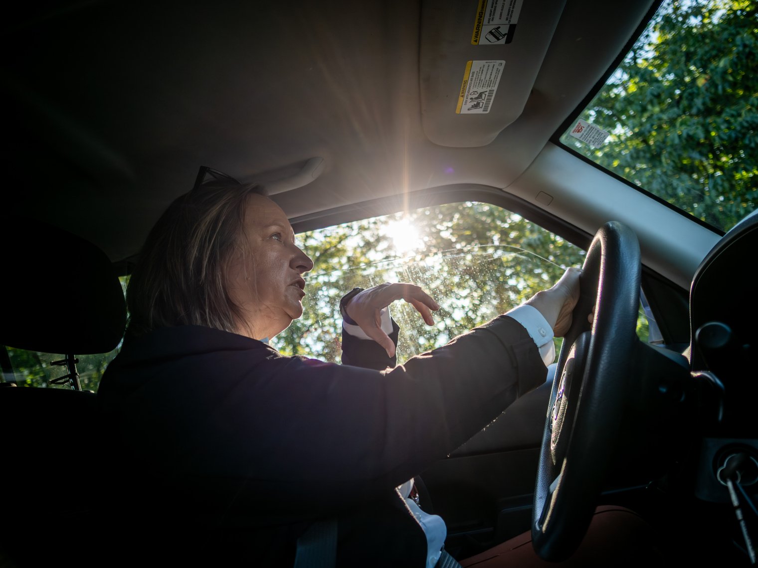 Monica Smith in her car in the morning on her daily commute.