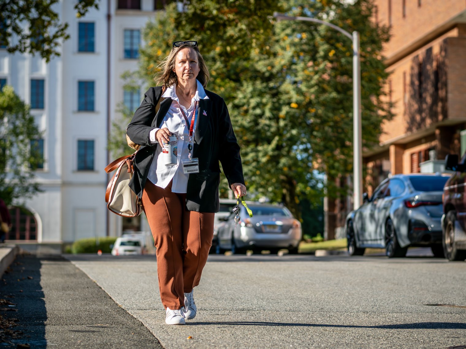Monica Smith on her way to a meeting in a hurry. 
