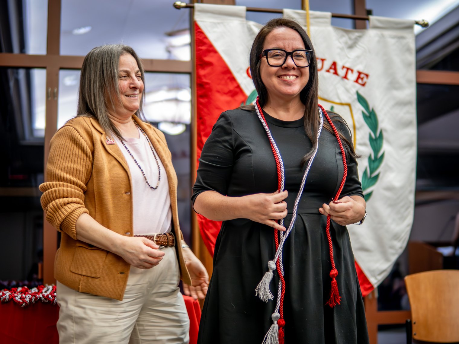 Inductees receive their honor cords.
