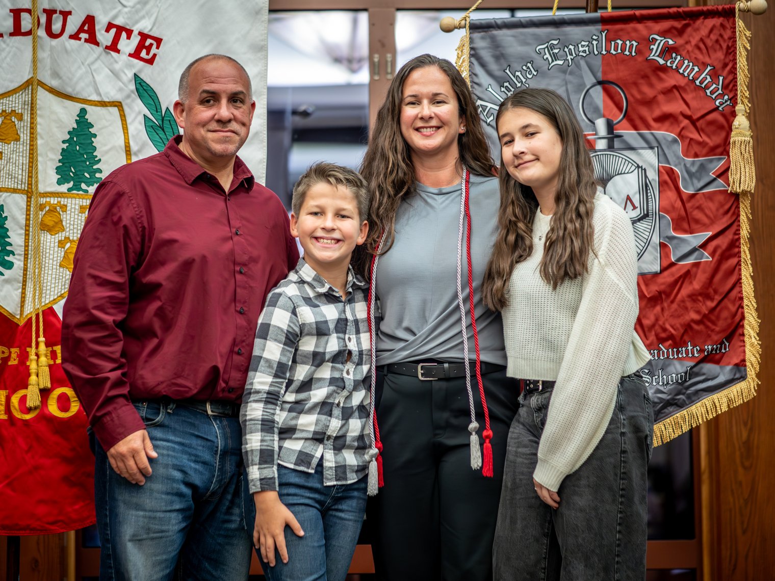 Proud families capture memories to celebrate their graduates’ accomplishments.
