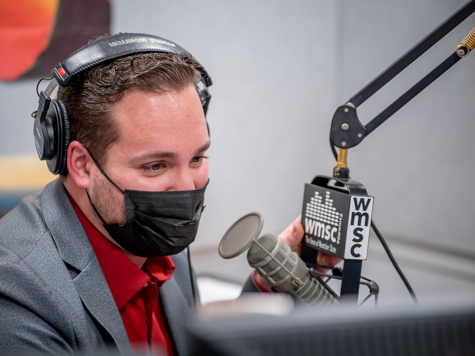 Zach Taglioli behind the mic