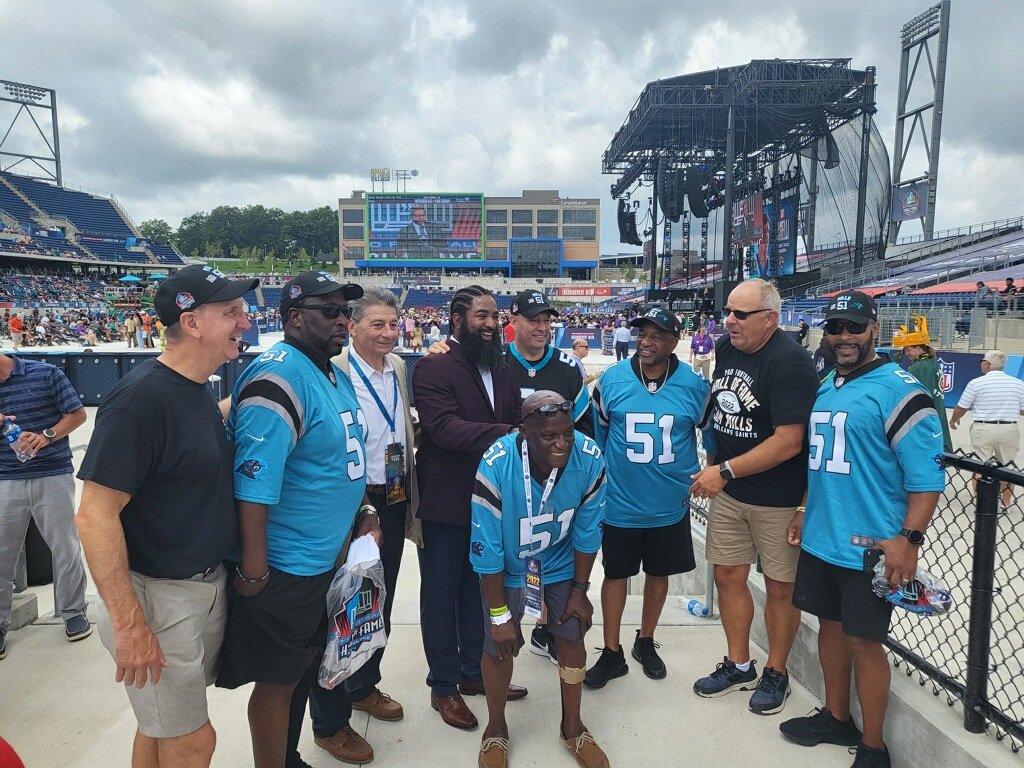 Rick Giancola, Sam Mills III, and some of Sam Mills’ college teammates