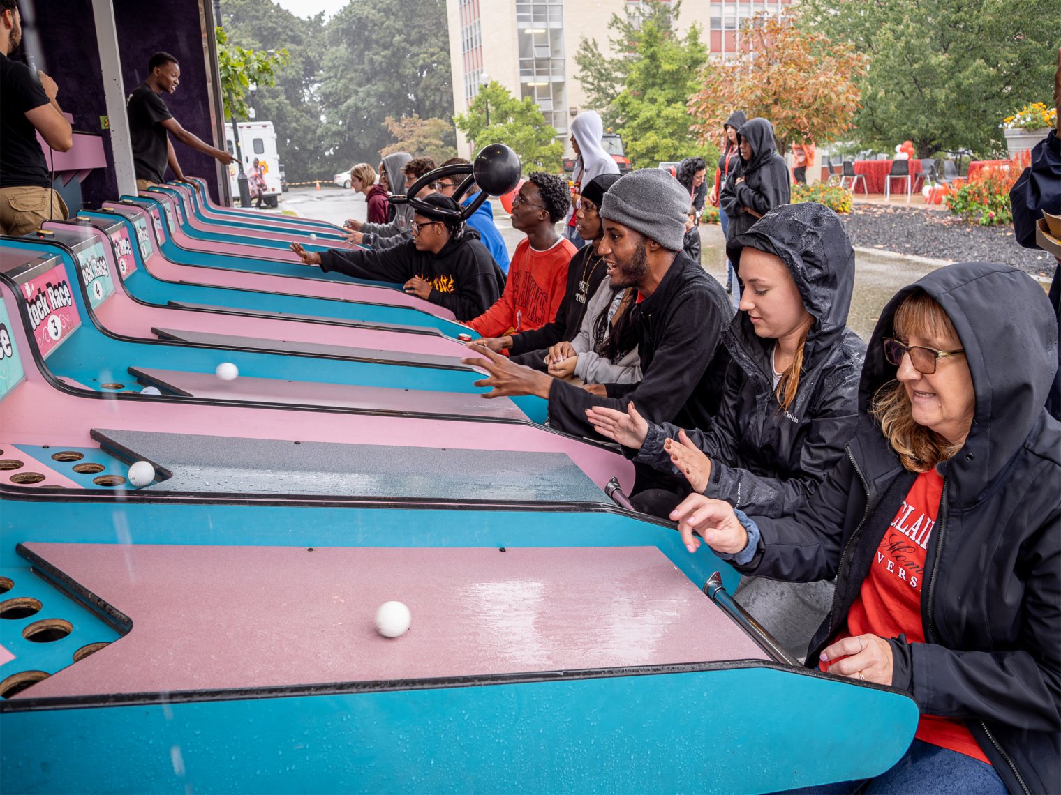 People playing skeeball.