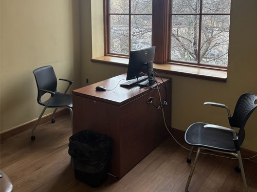 study room with table, chairs and computer