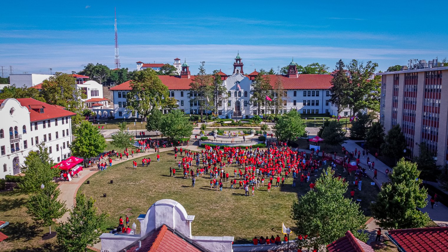 This image shows a group of students wearing red shirts on Montclair's campus.