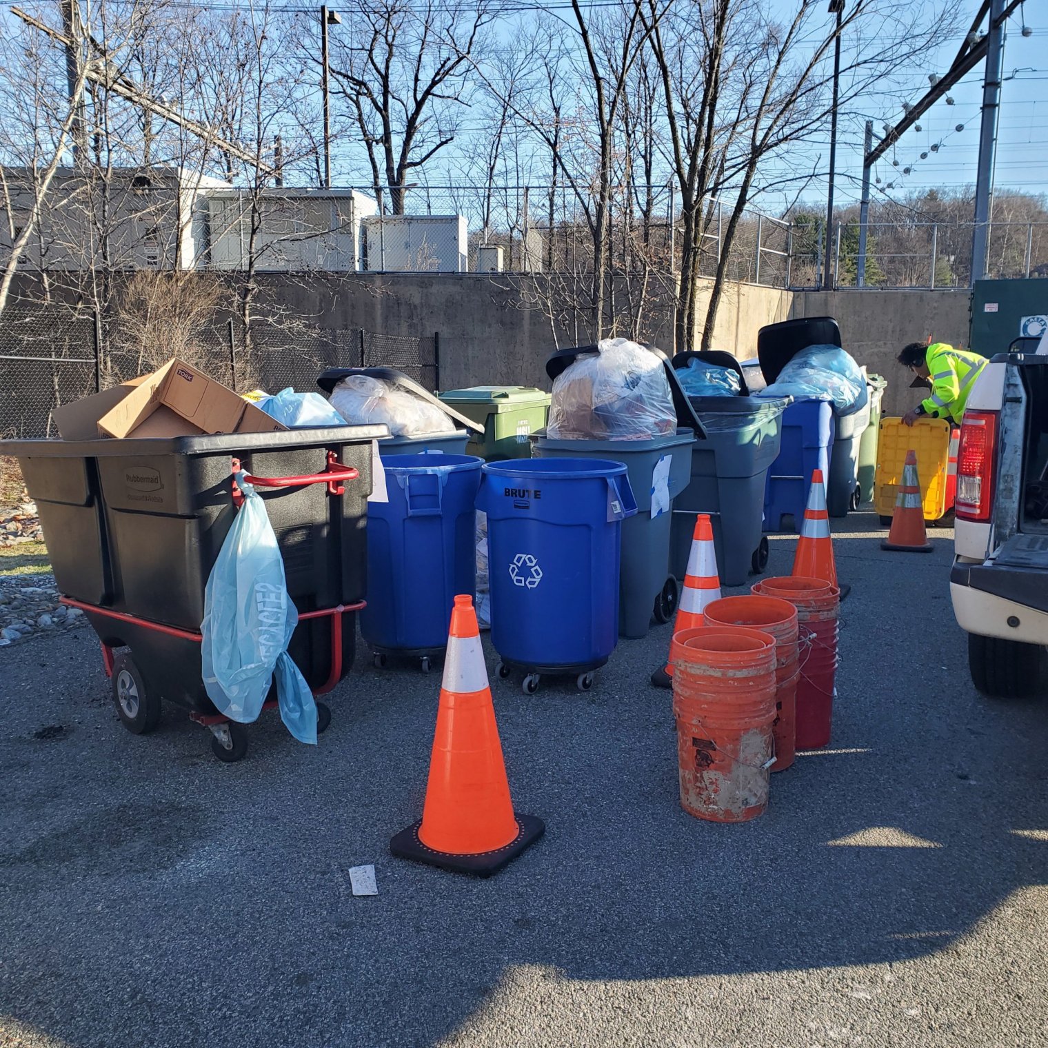 Photo of trash & recycling in containers collected for a waste audit.