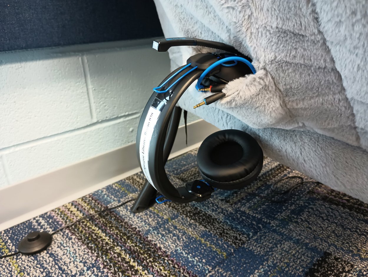 noise-cancelling headphone in chair pocket