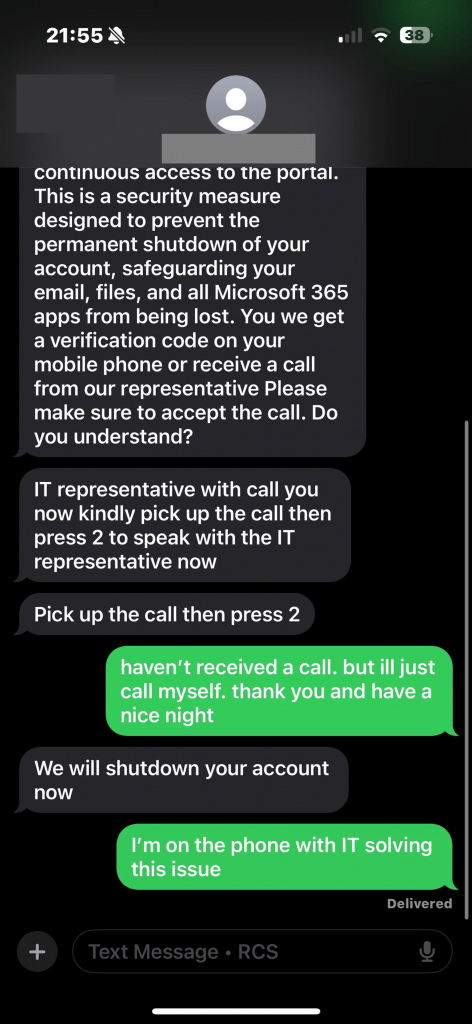 Screenshot of a text message related to a fake IT phishing attack.