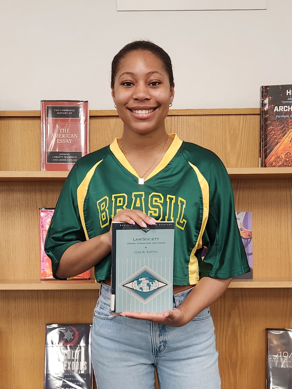 Amiya Strother holding a book