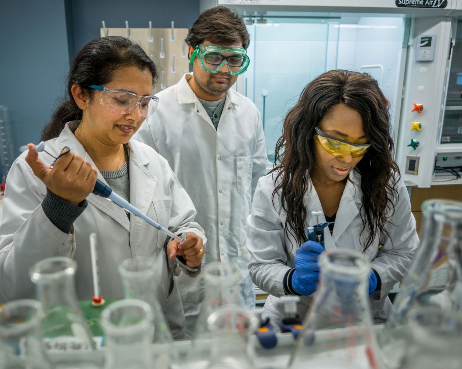 students conducting research in a chemistry lab