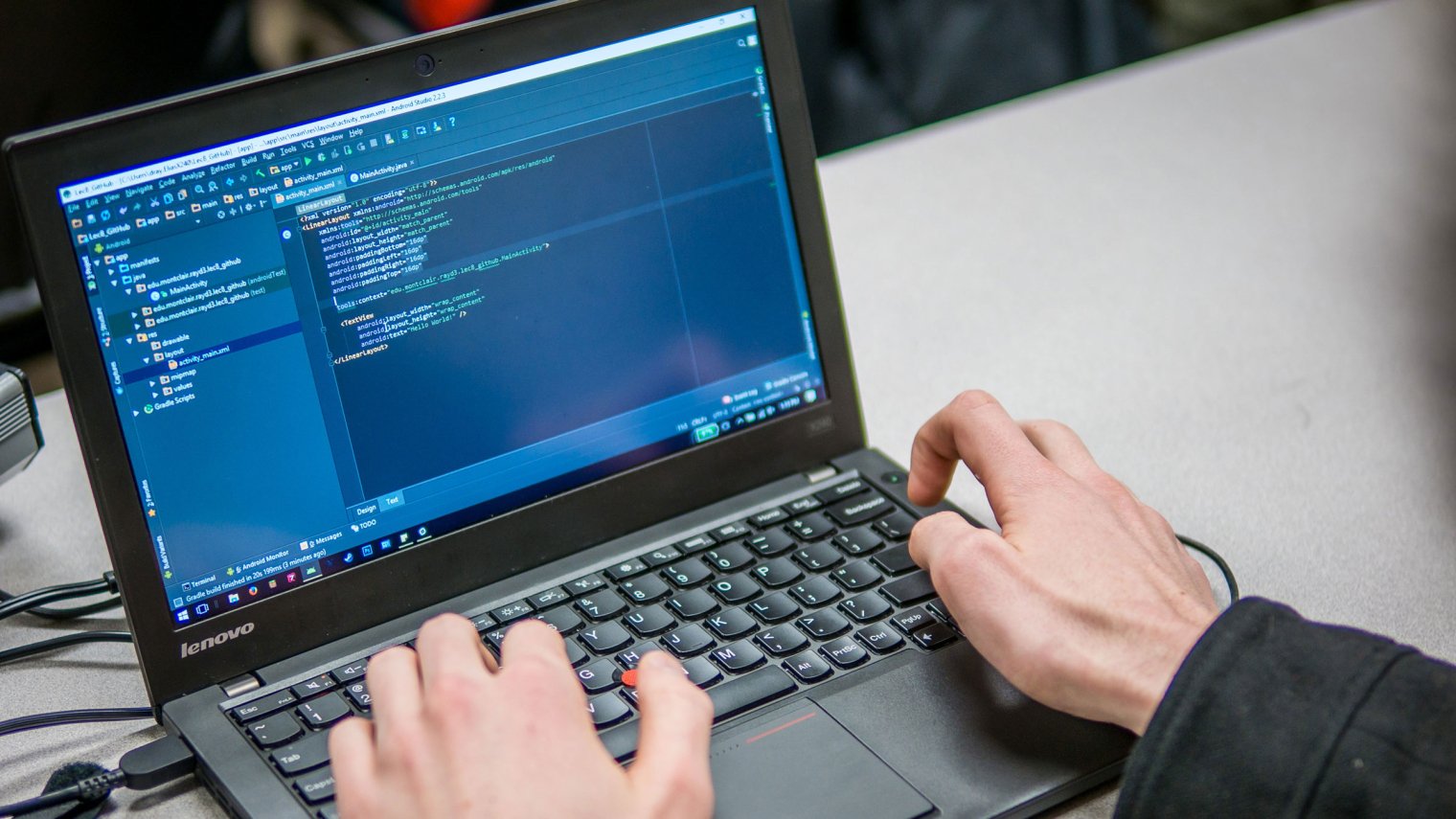 student working on programming project