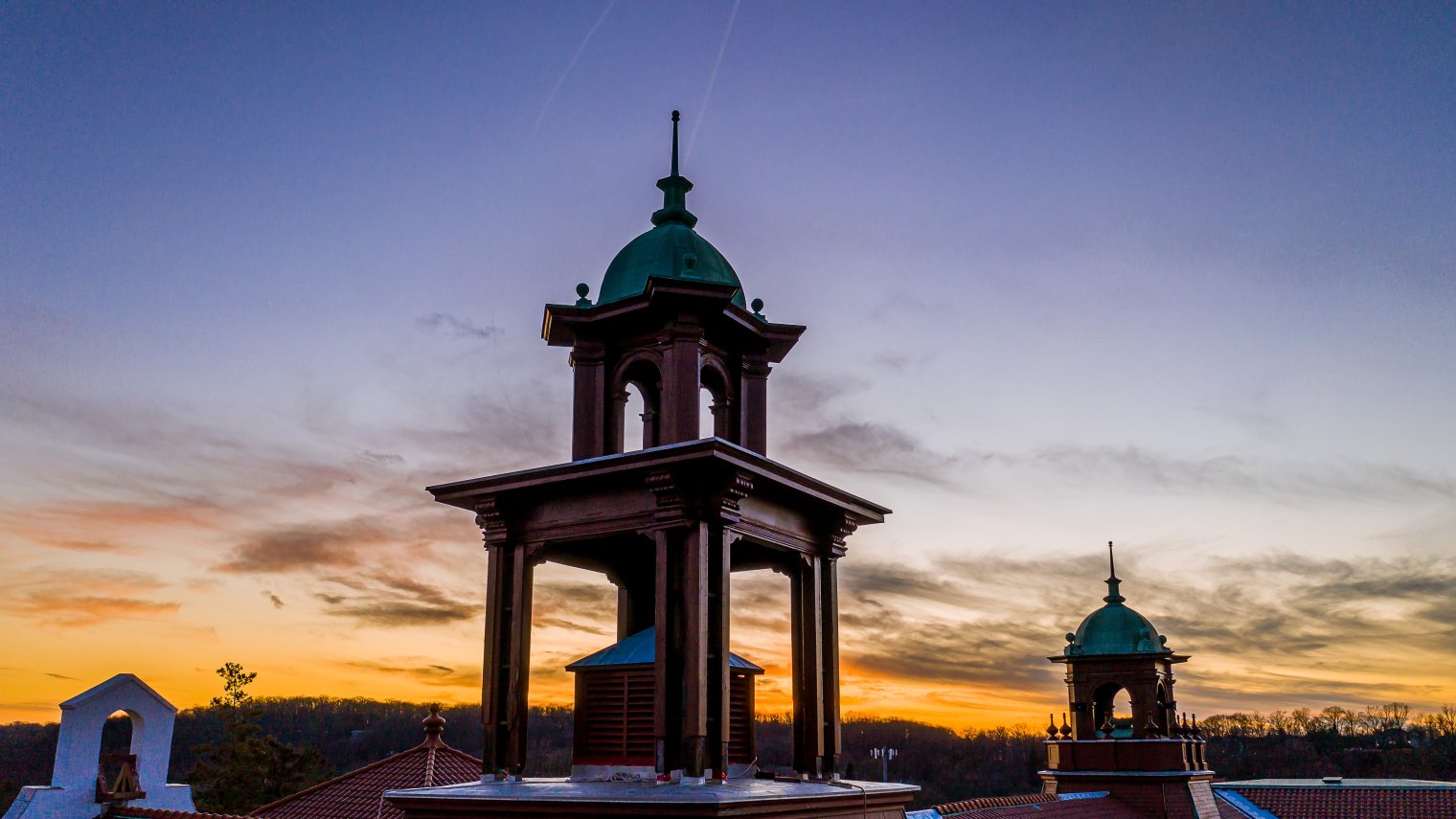 Aerial view of Cole Hall bell towers at dusk