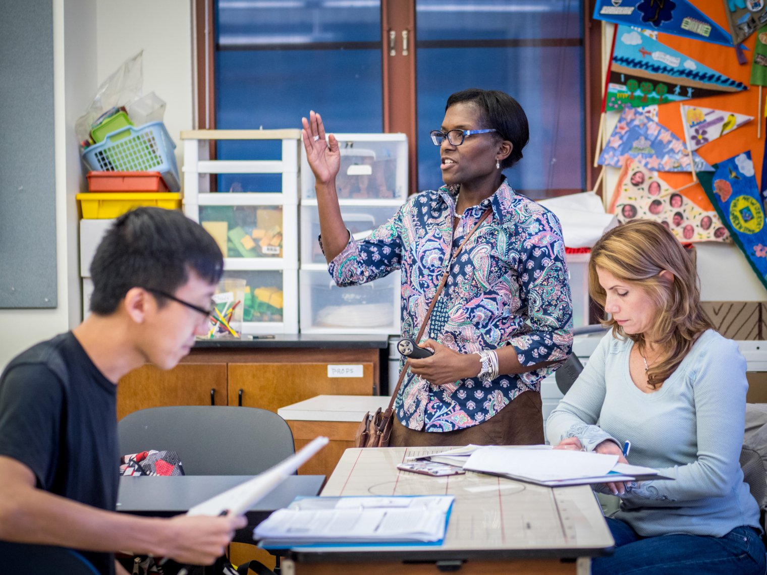 a teacher teaches two students