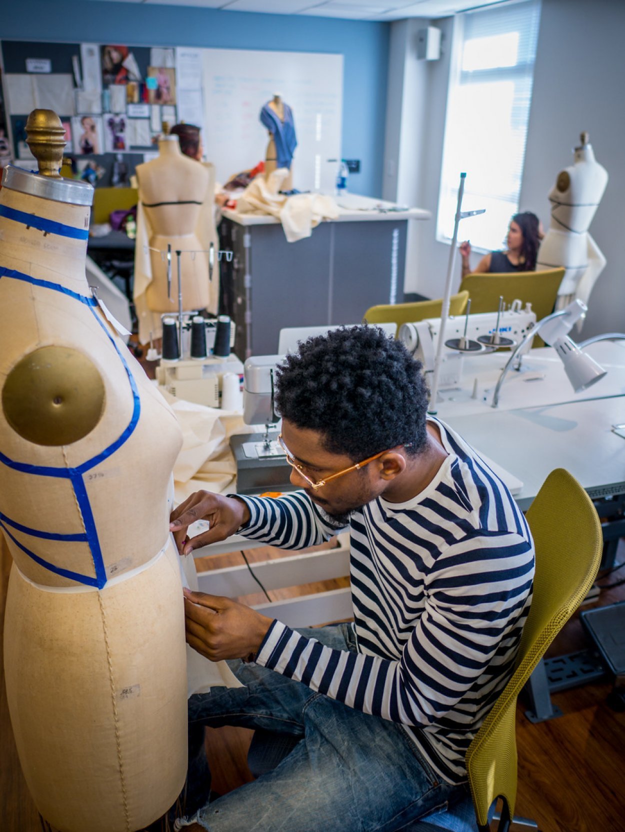 Fashion student working in studio