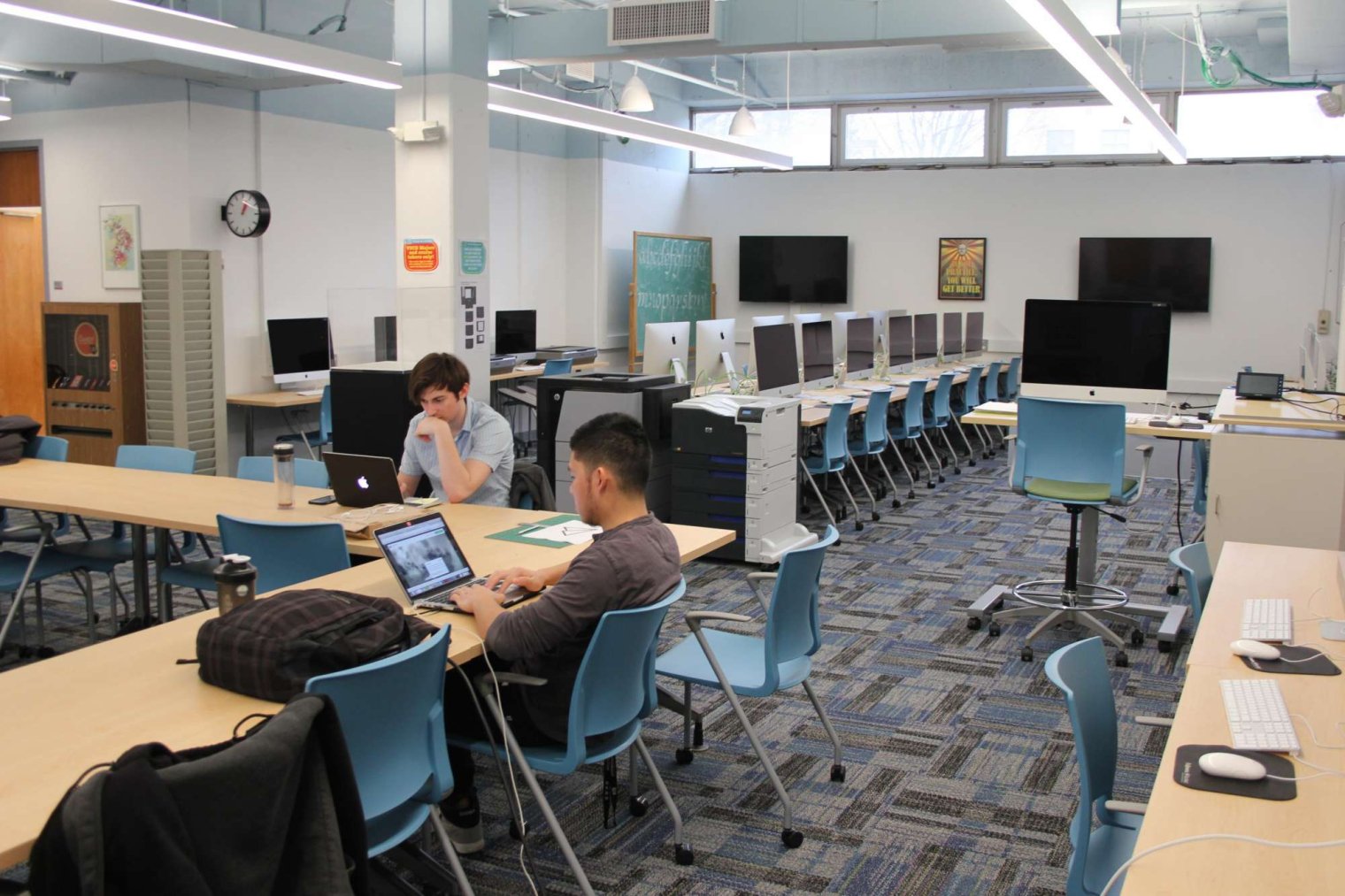 Students working in Graphic Design Studio