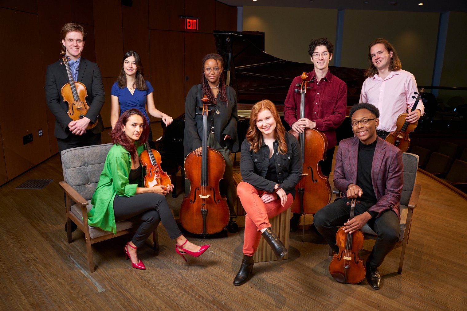 Cali Collective members in group photo with instruments
