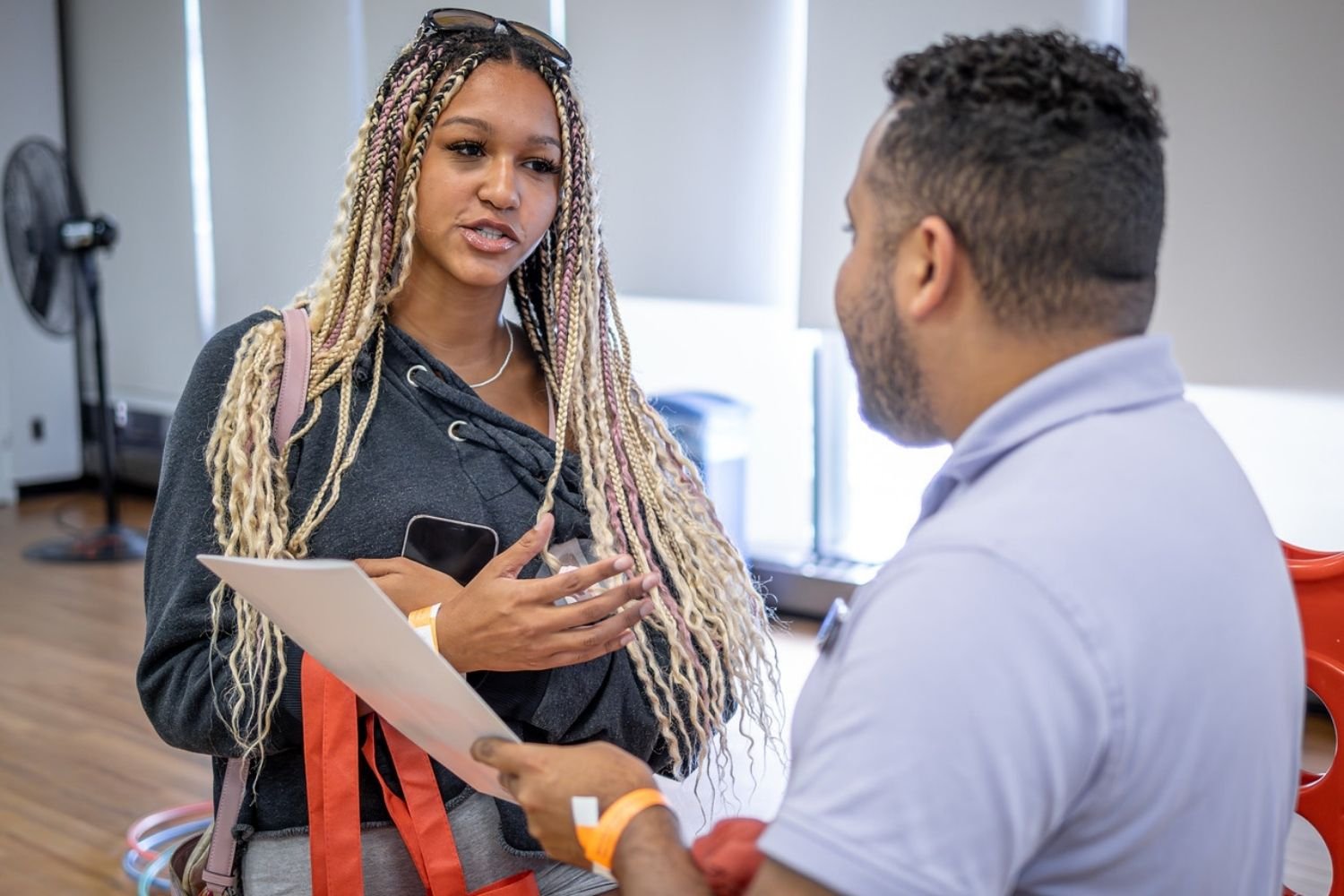 Advisor helps student at an advising event.