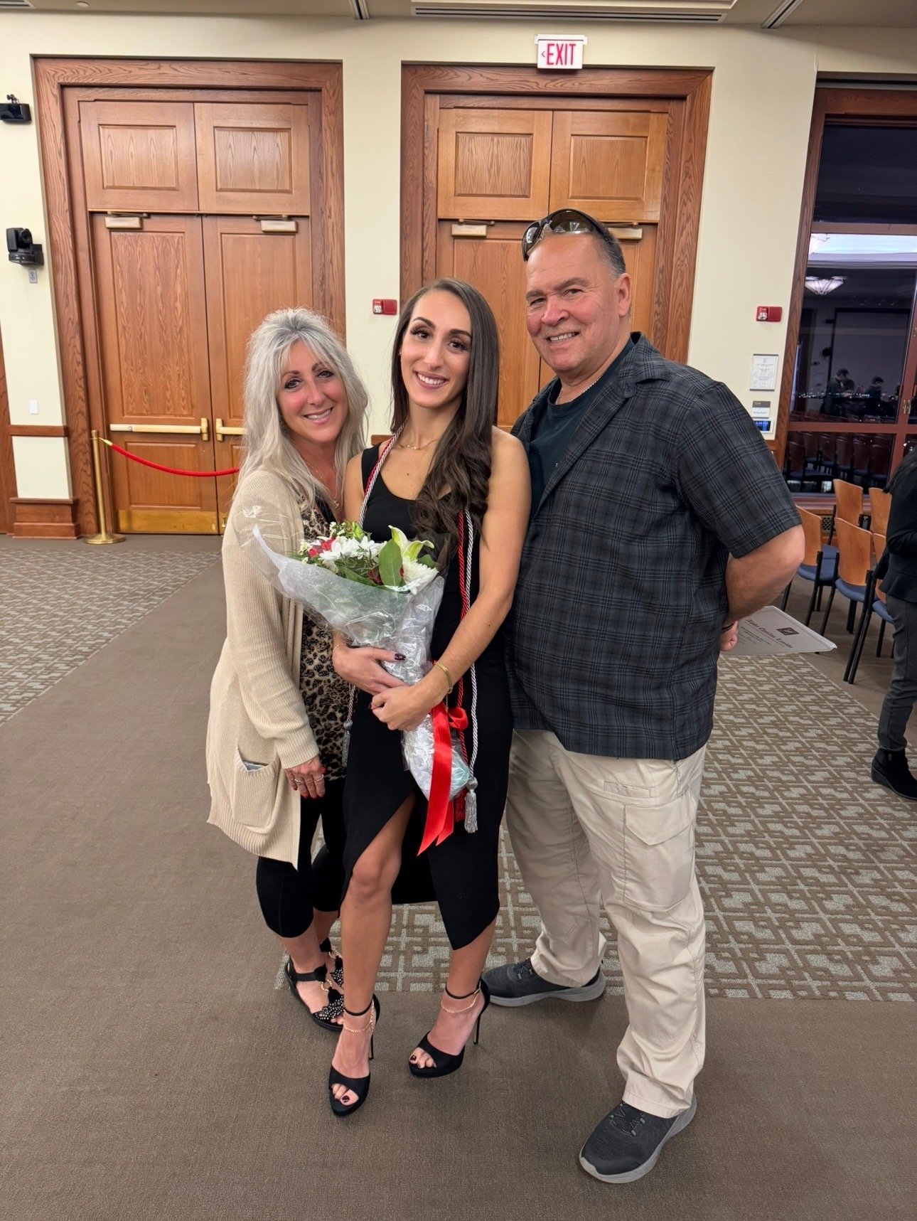 For Dina, being supported by her family and friends at her AEL Induction was one of the most meaningful moments of her graduate experience.