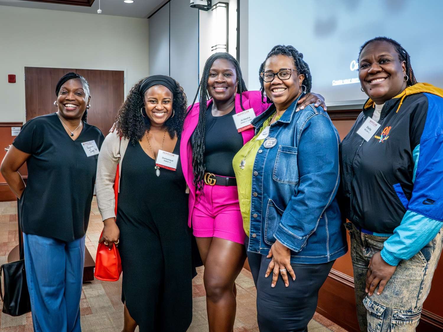 group of alumni smiling together 