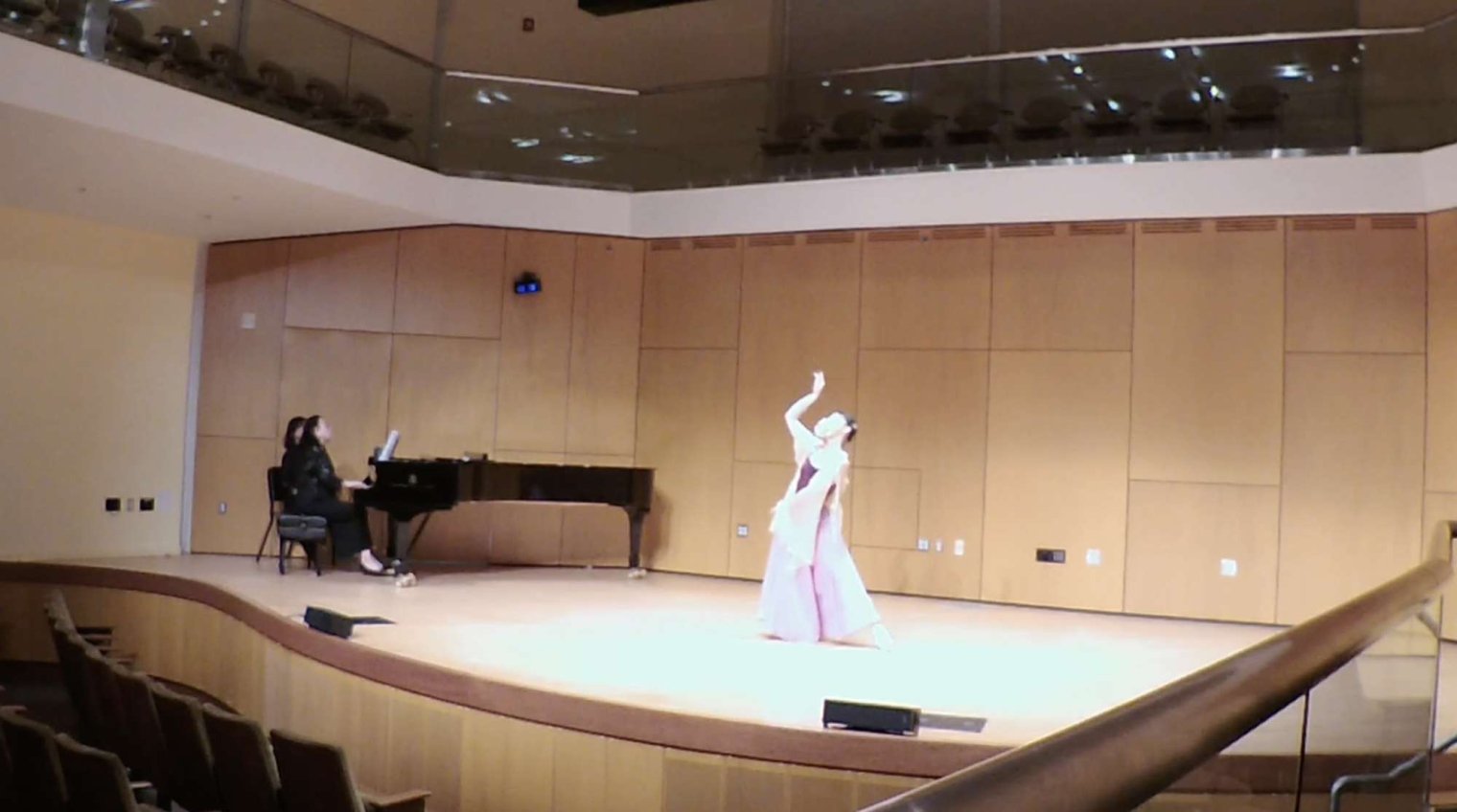 Video Still of Runju Feng on stage 
