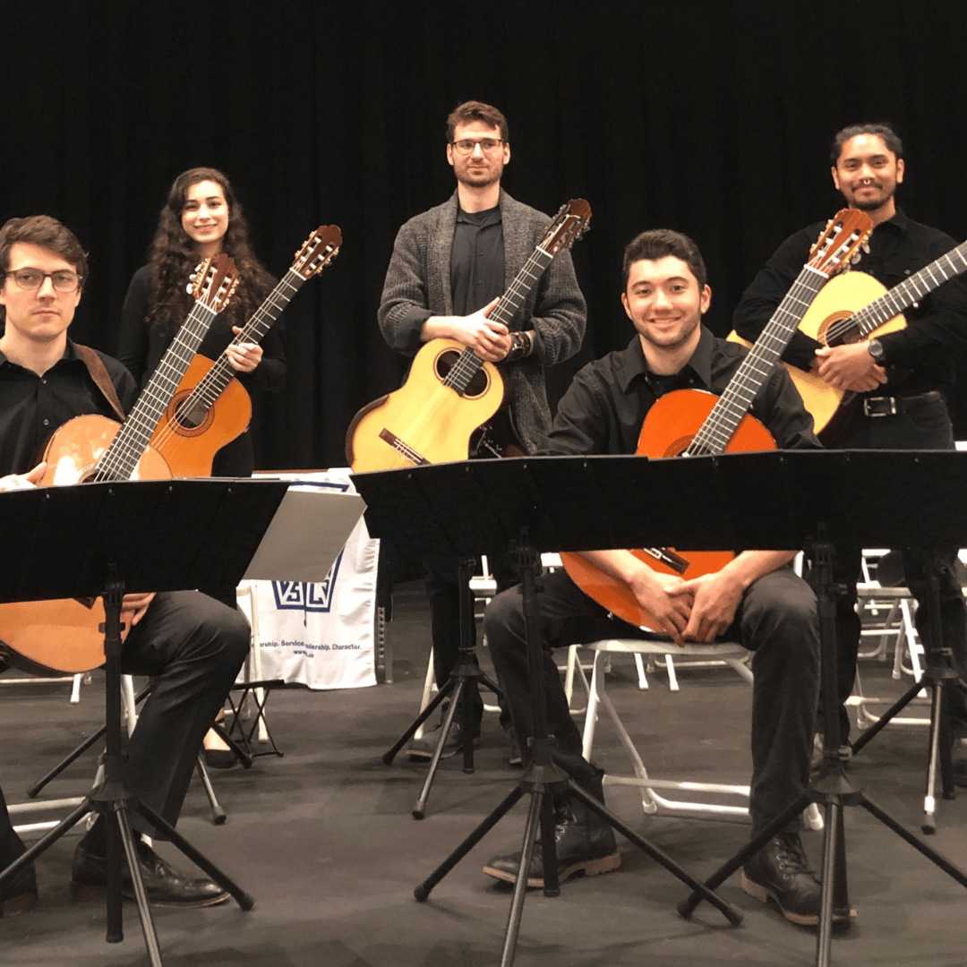Classical guitar performers in a group photo