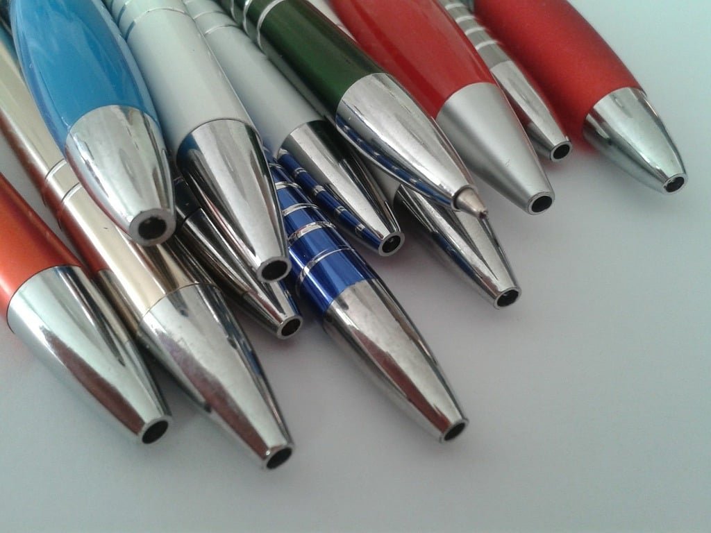 cluster of ballpoint pens
