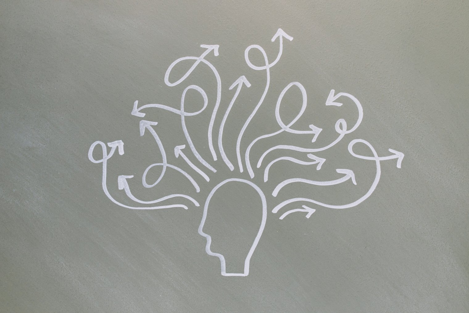 Illustration of a human head with arrows branching out, representing thoughts, ideas
