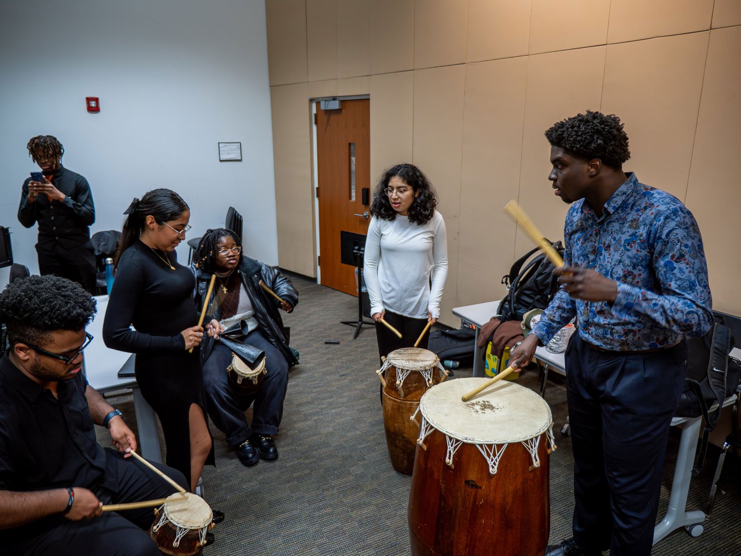 Isaac Afriyie-Addo practices African drums