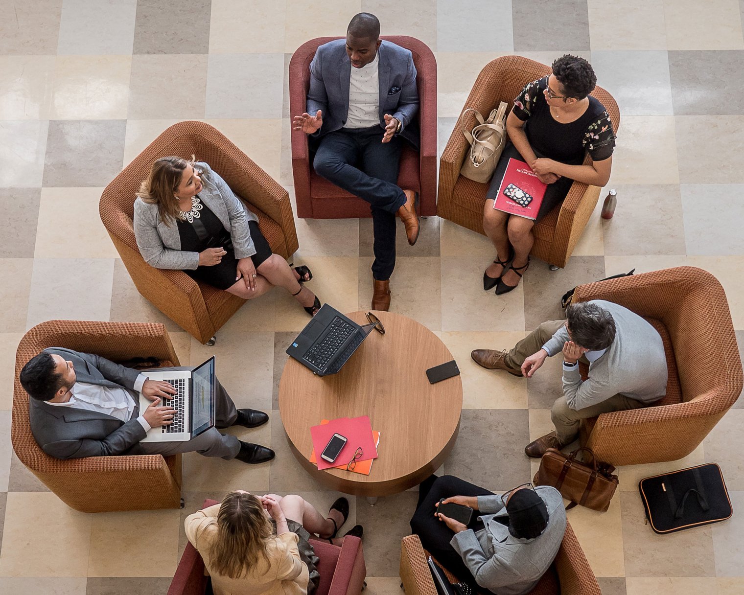 Faculty and staff collaborating in a group discussion
