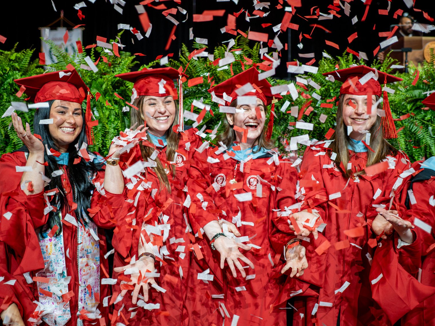 Graduates celebrate with confetti