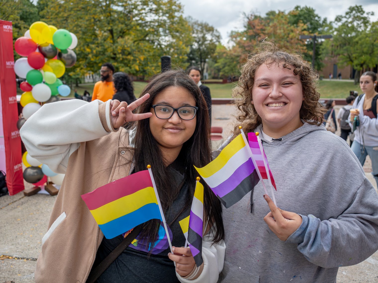 students and staff at Queer event