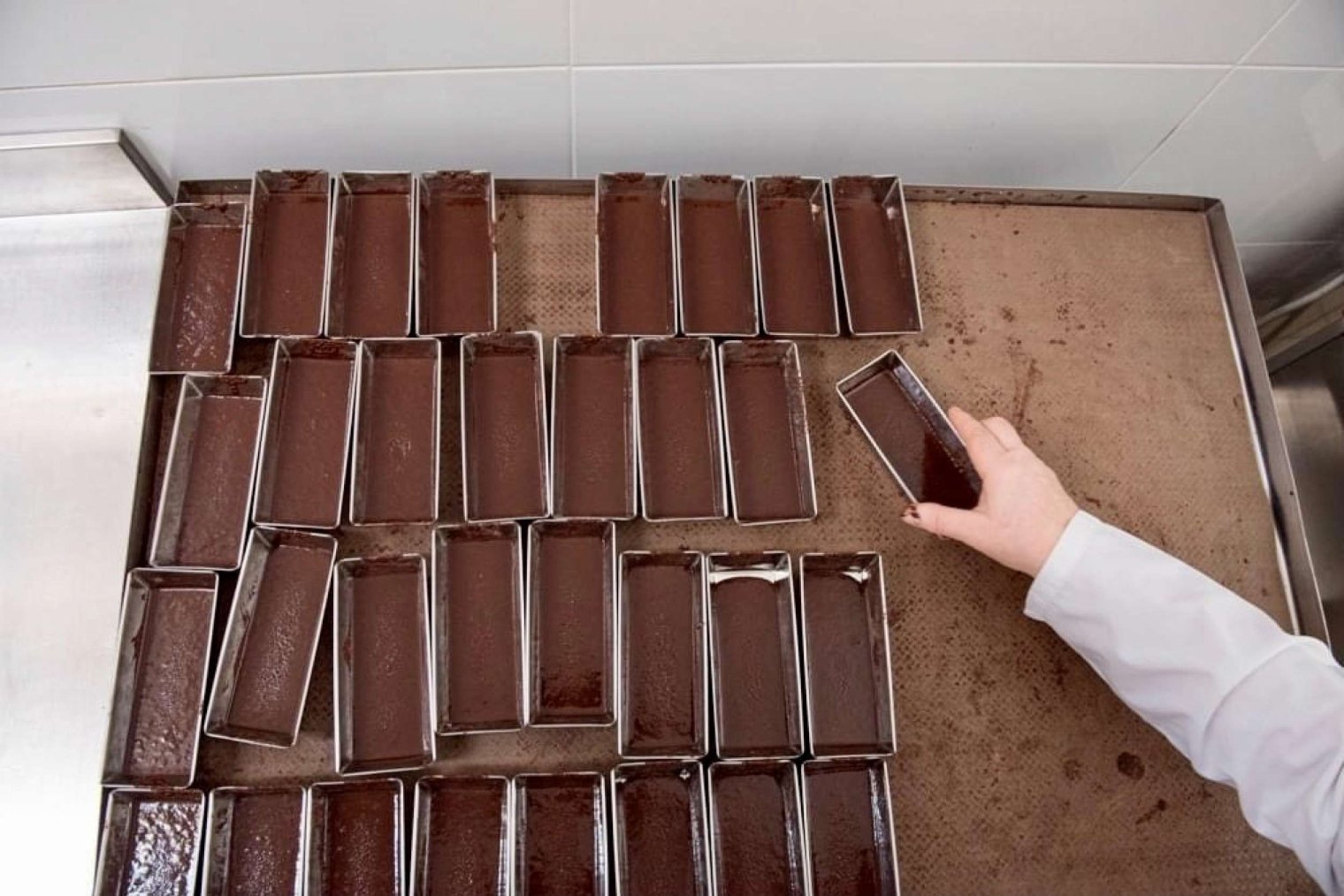 chocolate being made into molded container