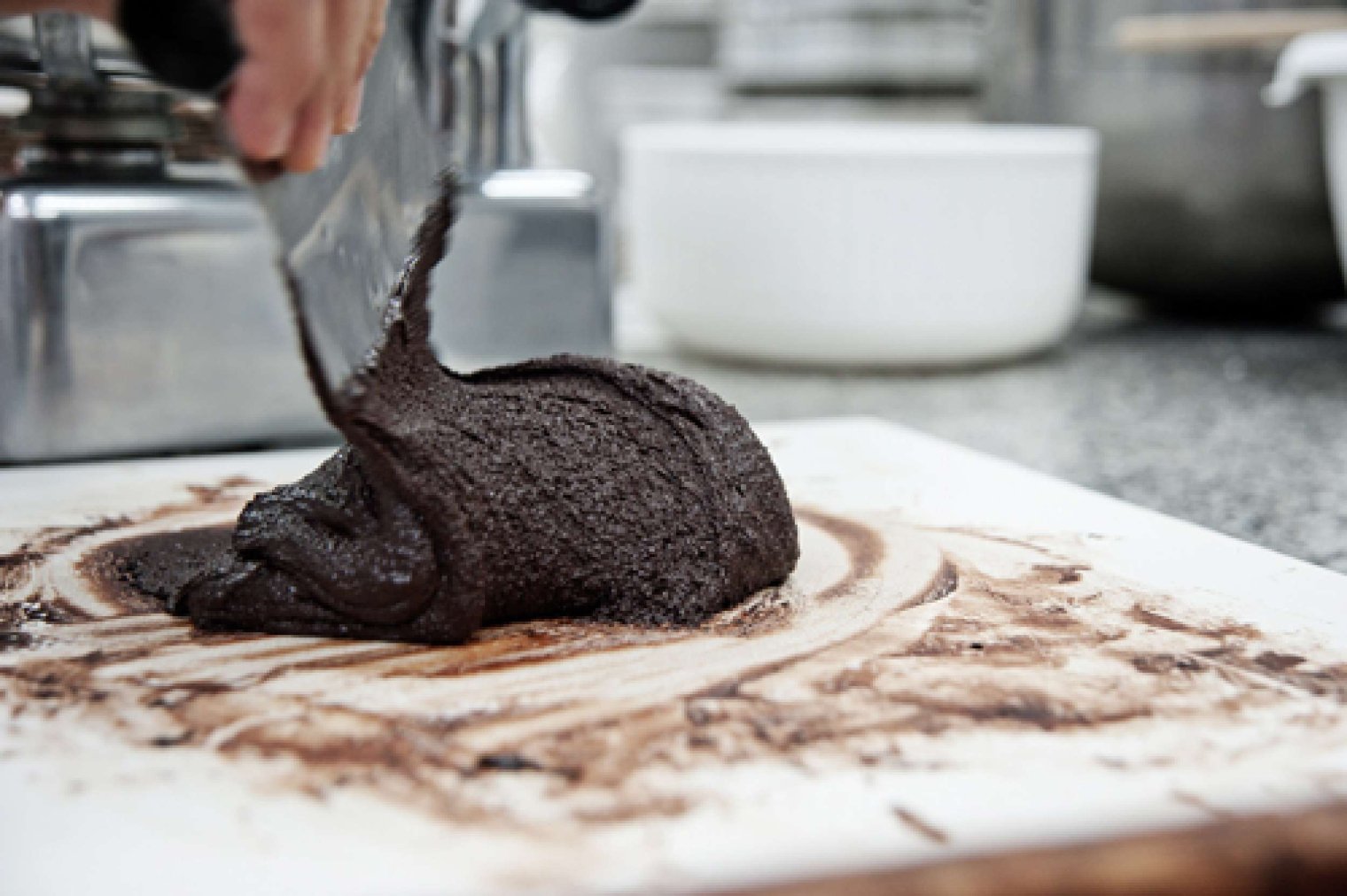 chocolate paste being mixed on counter