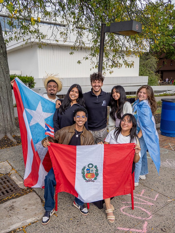 HHM Block Party Pic of Students and Flags