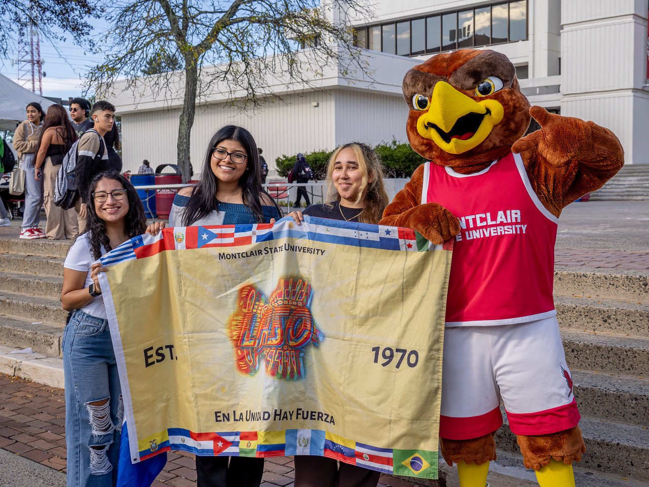 HHM Block Party photo with Rocky and LASO students