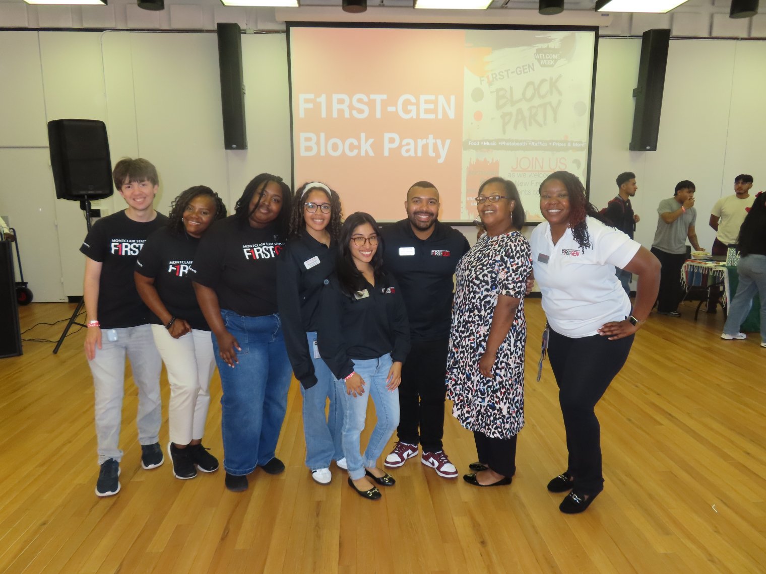 Tahina and coworkers pose together at the F1rst Gen Block Party.