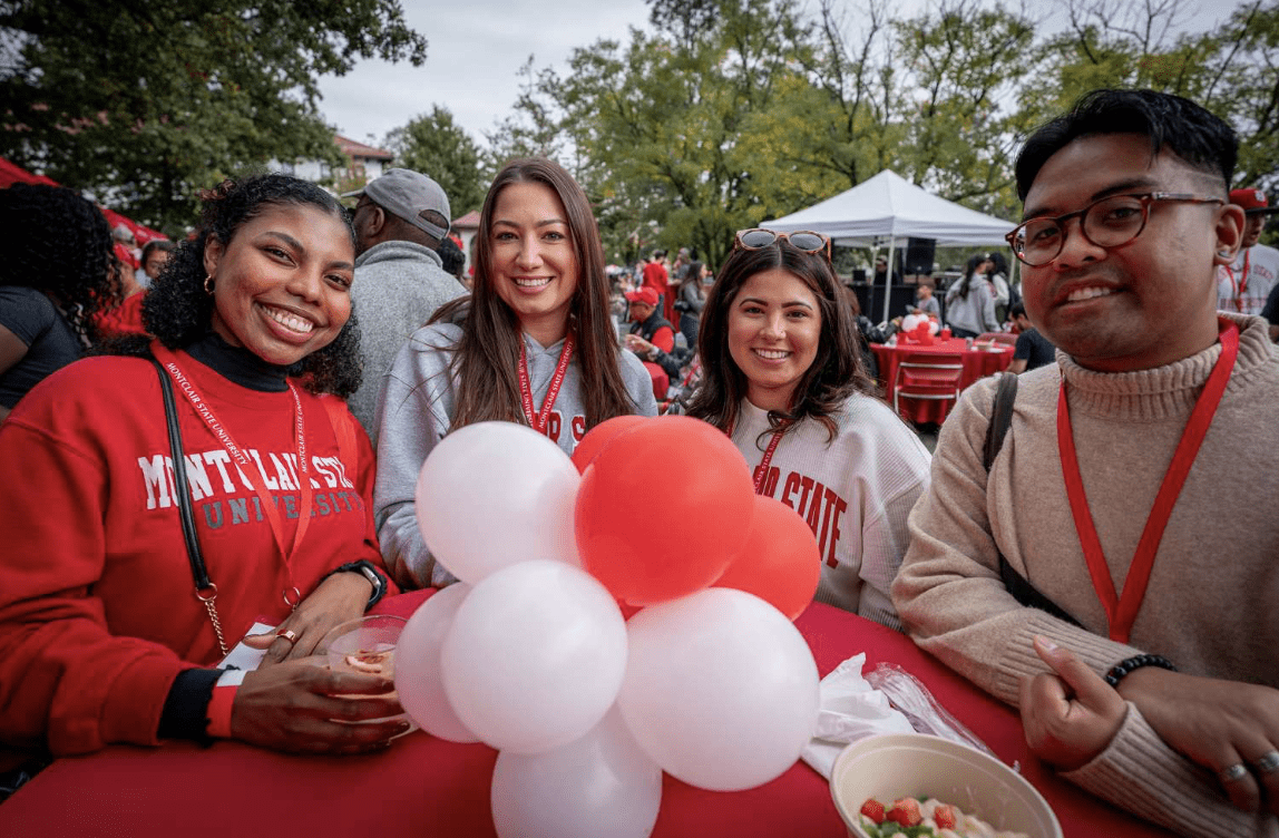 Group of students at the alumni BBQ during homecoming