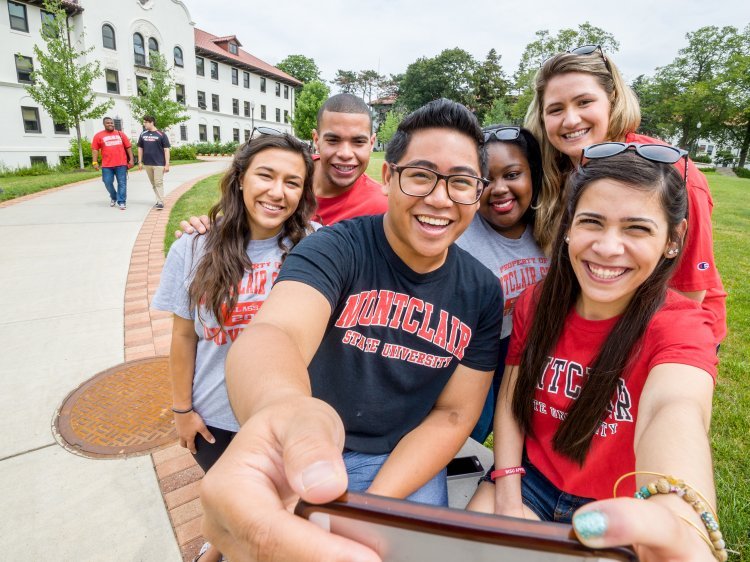 A group of college students taking a selflie 