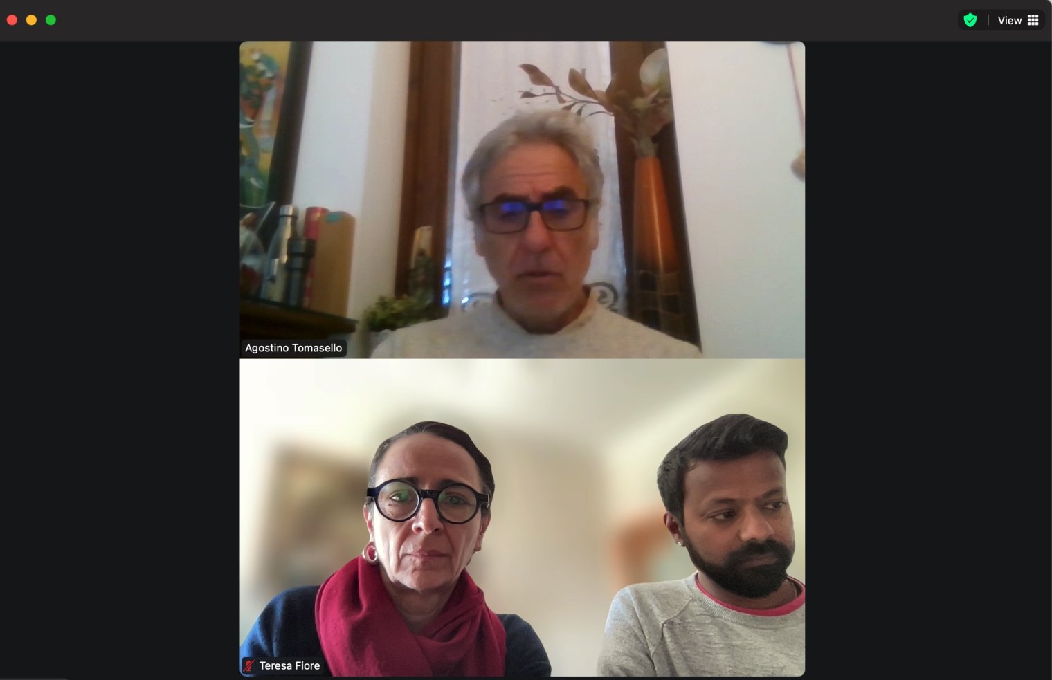 A zoom meeting screenshot between three people