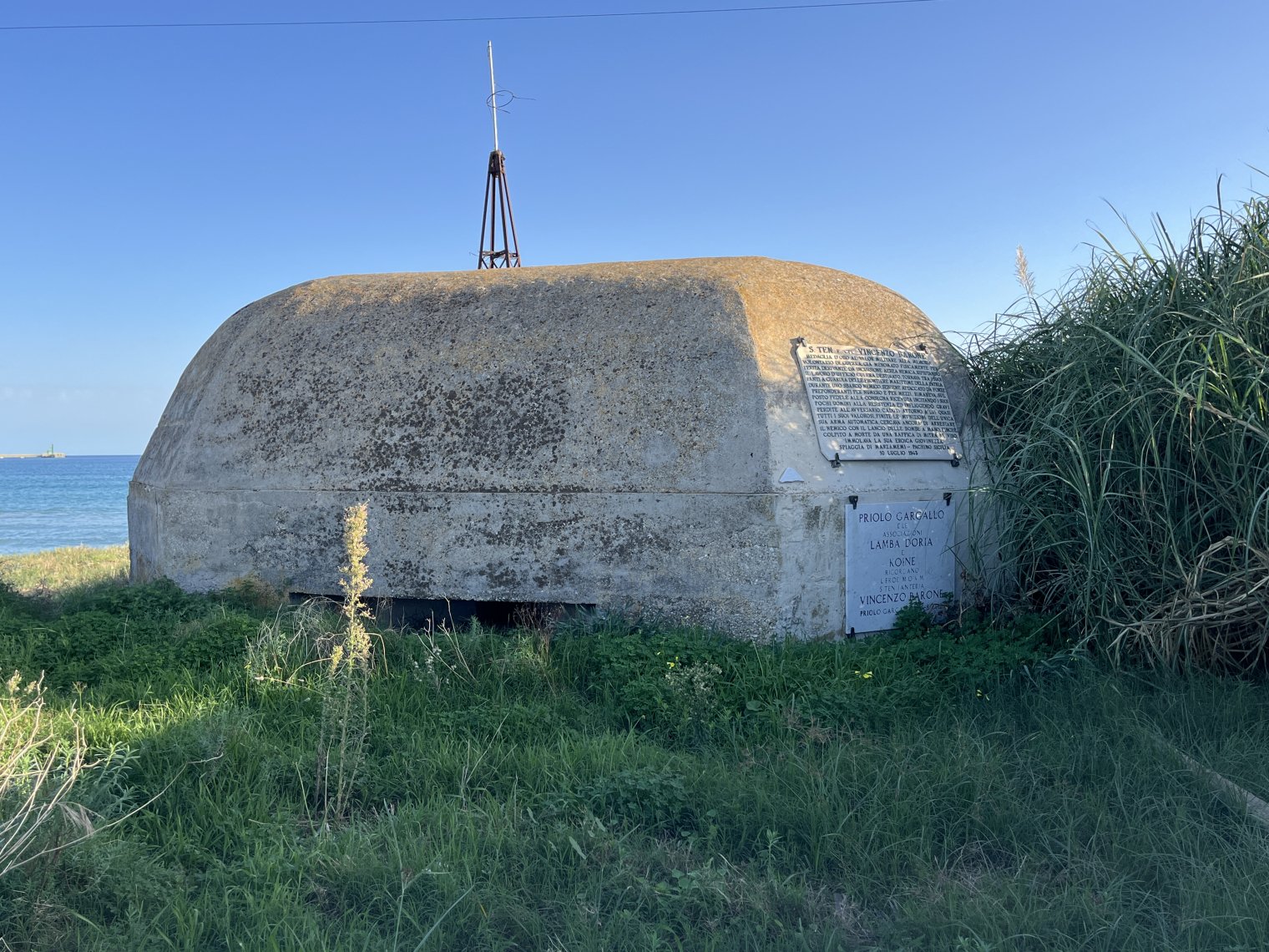 The back of a WW2-era bunker on an Italian beach