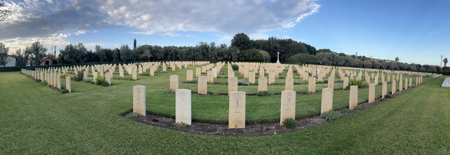 Rows of identical white graves at a British cemetary in Italy