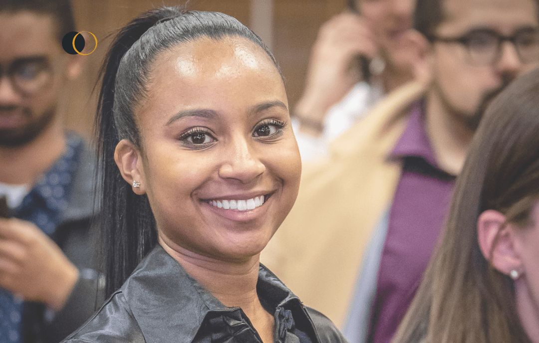 student smiling at career fair