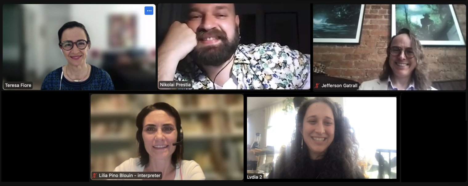A screenshot from a Zoom call with five people in an active conversation