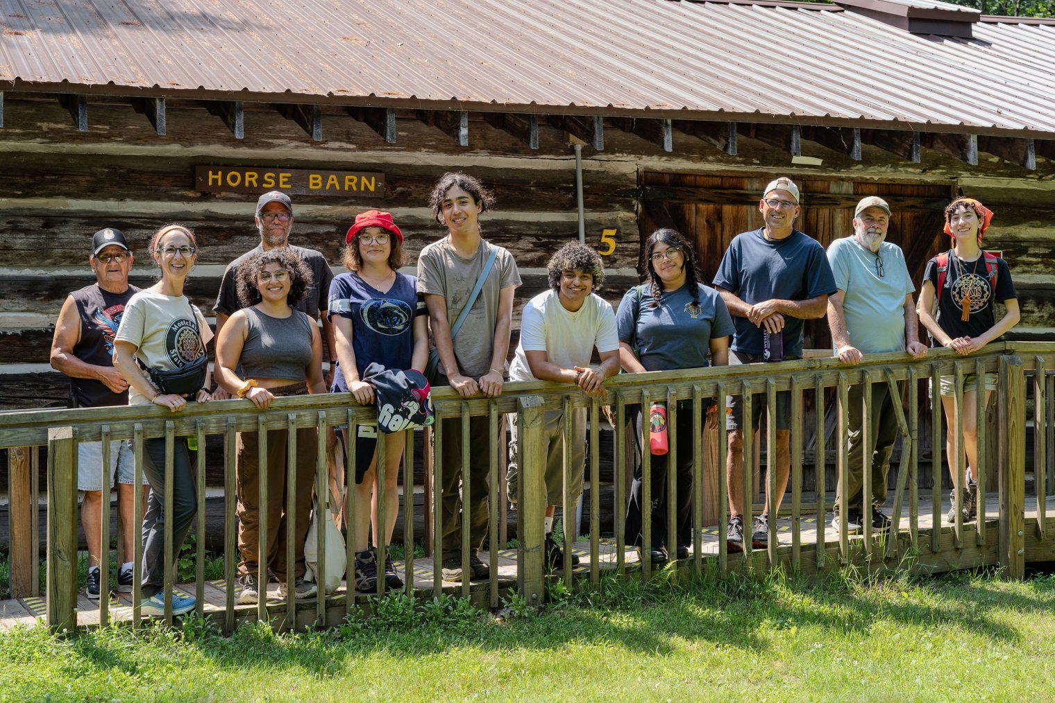 NAIS Wisconsin trip team members pose for photo at the Menominee Logging Museum credit- Mate Forgacs