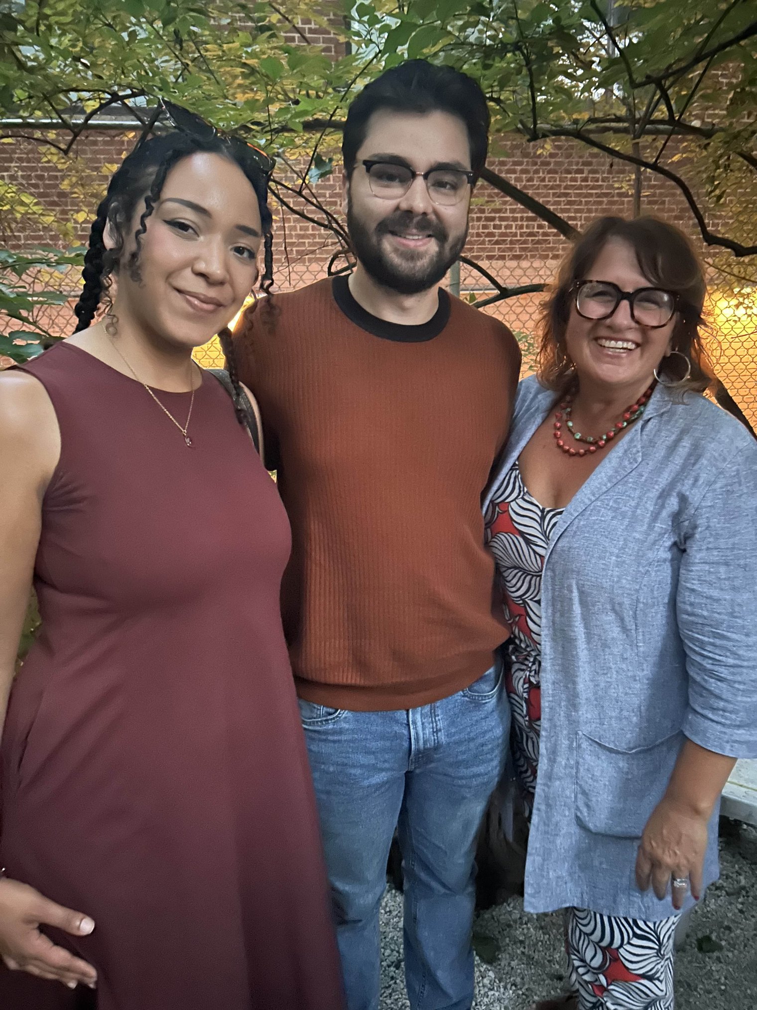 Photo of Kathy Curto w/two alumni