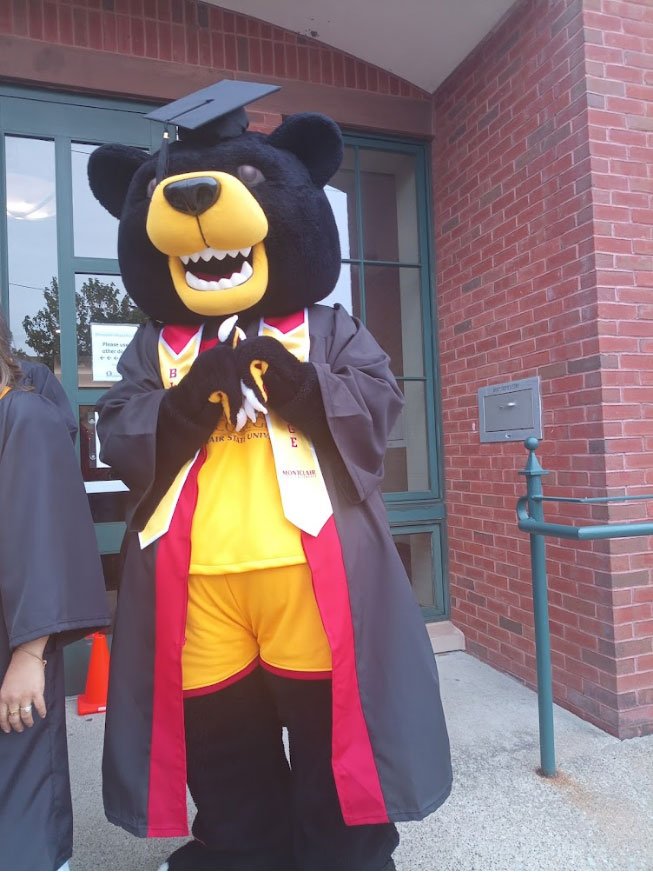 deacon in graduation gown