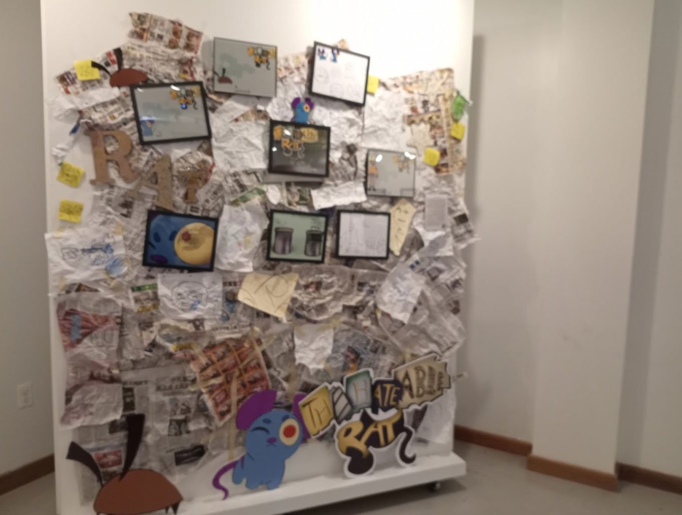 art wall featuring various art pieces